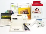 Canon Selphy CP760 Compact Photo Printer & (1) Color Ink / Paper Set KP-108IN. Fixed Price $165.95.