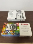 Canon Ixy Digital PC1001 Camera With PK400 Computer Connection Kit. Fixed Price $151.16.